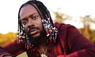 Adekunle Gold warns fans about critics